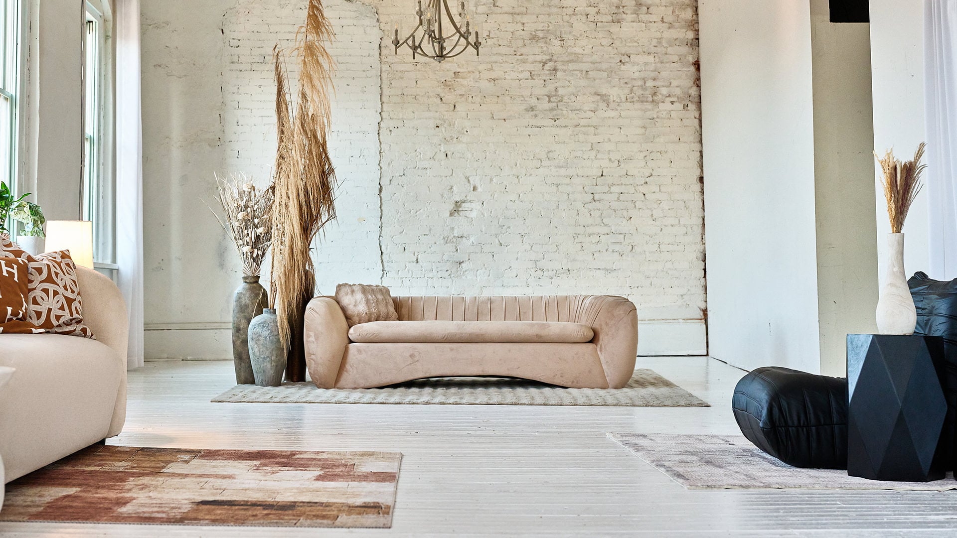 Studio A brick wall and velvet sofa